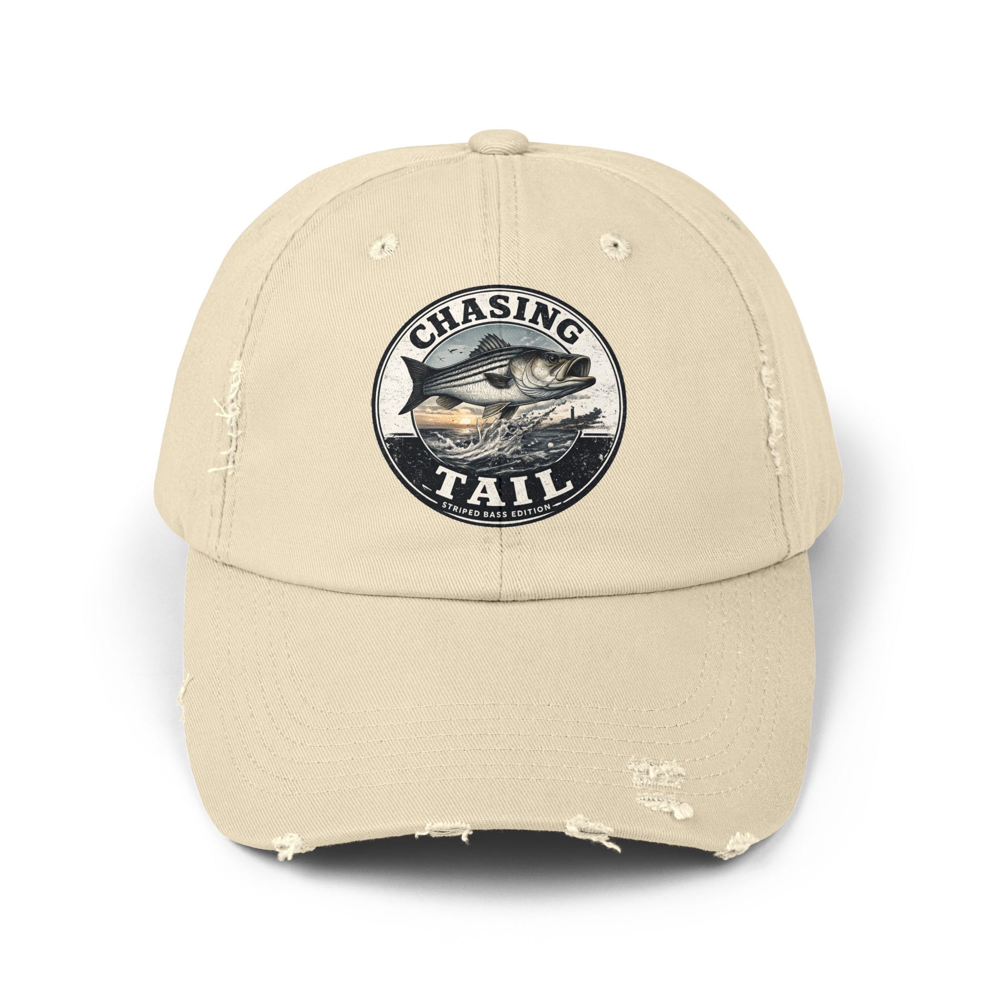 A beige distressed baseball cap featuring a circular embroidered patch on the front with a fish and the text 'CHASING TAIL'.
